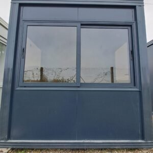 GUERITE DE SECURITE/CABINE DE SECURITE GRIS ANTHRACITE VITRES TEINTEES VENDUE MONTEE 2.40M X 1.50M 4300 EUROS H.T./ 5160 EUROS TTC